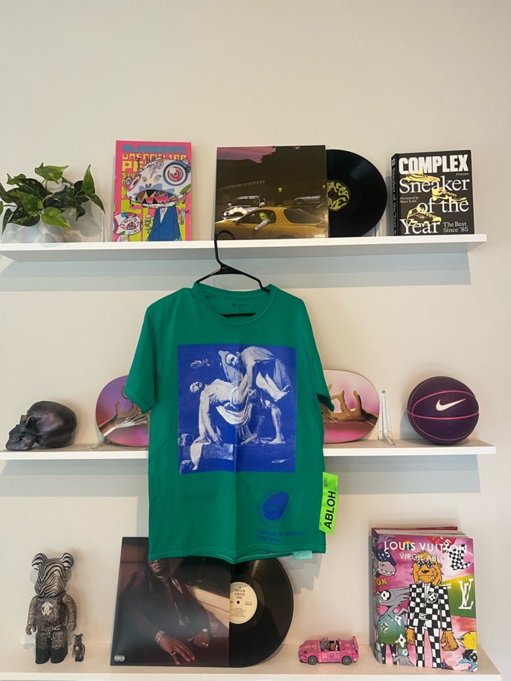 Green Short-Sleeve Graphic Tee with Blue Artwork
